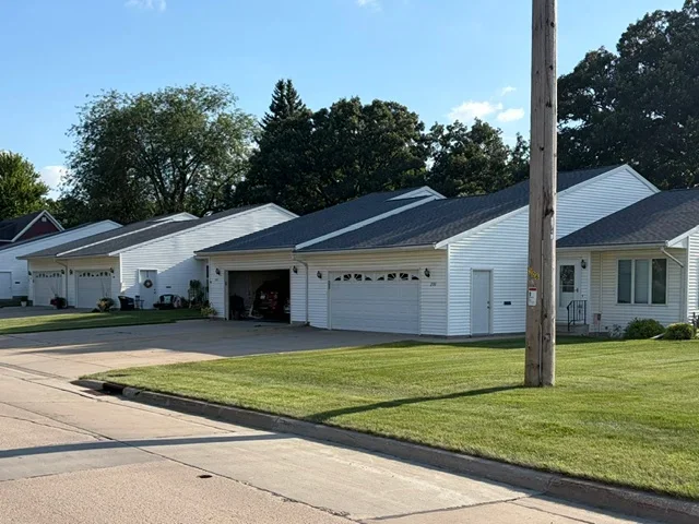 New dark gray architectural asphalt shingle roof on residential home with multiple roof planes